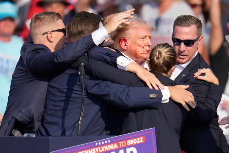 Trump post shooting surrounded by secret service